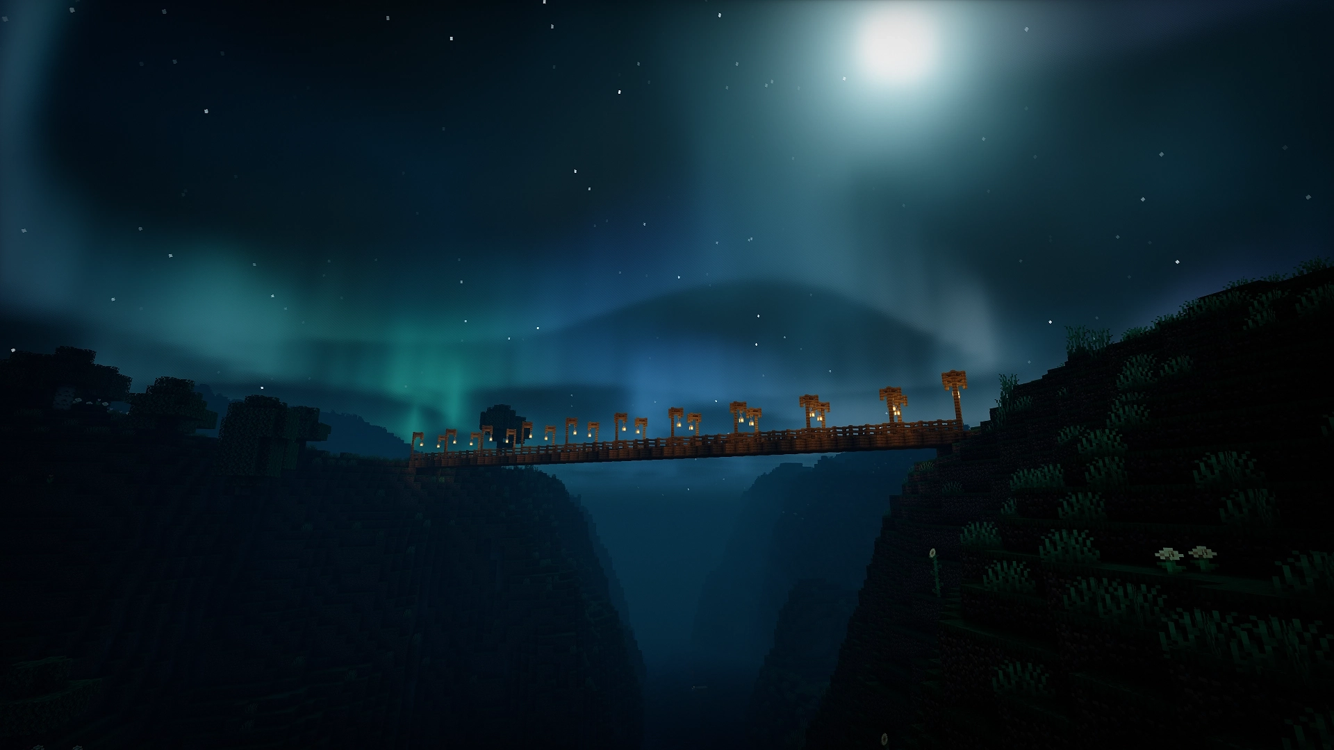 A cinematic shot of a tiny wooden bridge spanning two cliff sides on either side of the frame. The bridge has evenly spaced poles on either side of it with a shroomlight to illuminate the entire thing. The scene is set in the night time and the Aurora Borealis is visible in the background.
