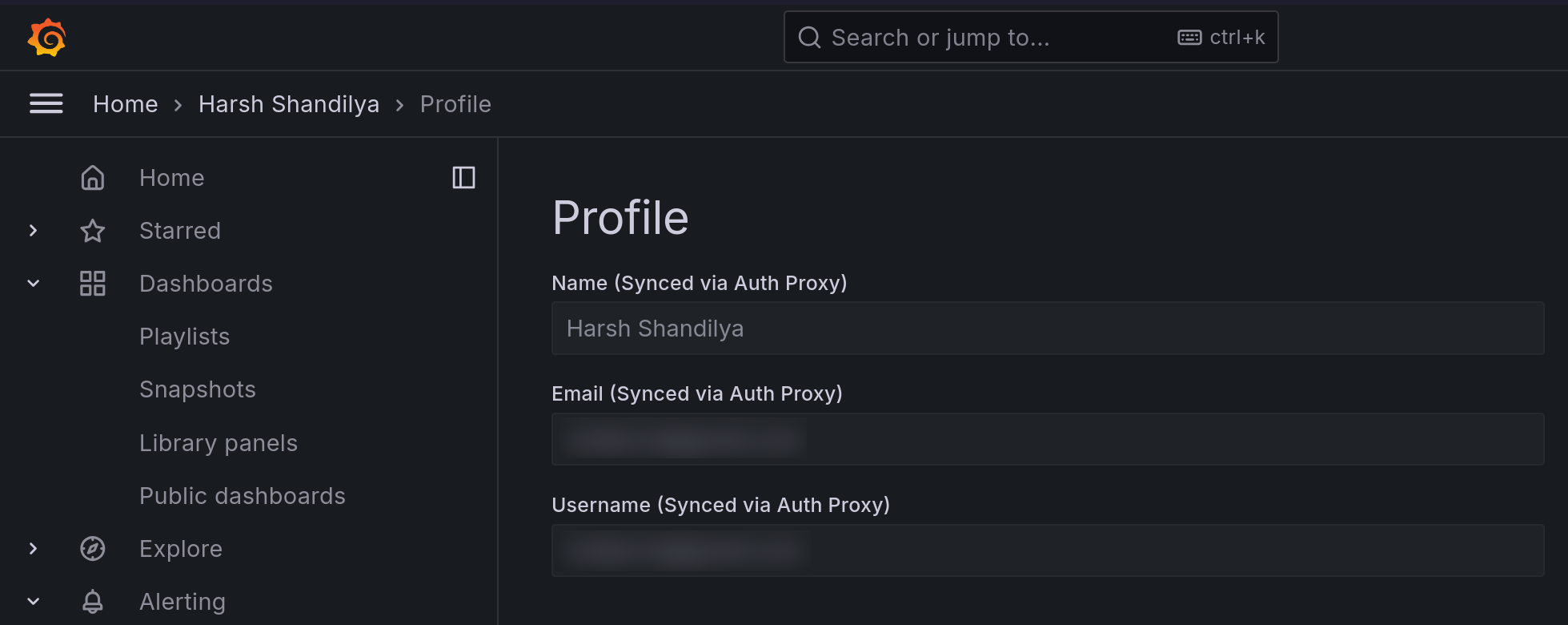 The profile page on Grafana, showing the name, email and username fields with an additional 'synced via auth proxy' label next to them. The email and username have been blurred out to redact them for privacy reasons