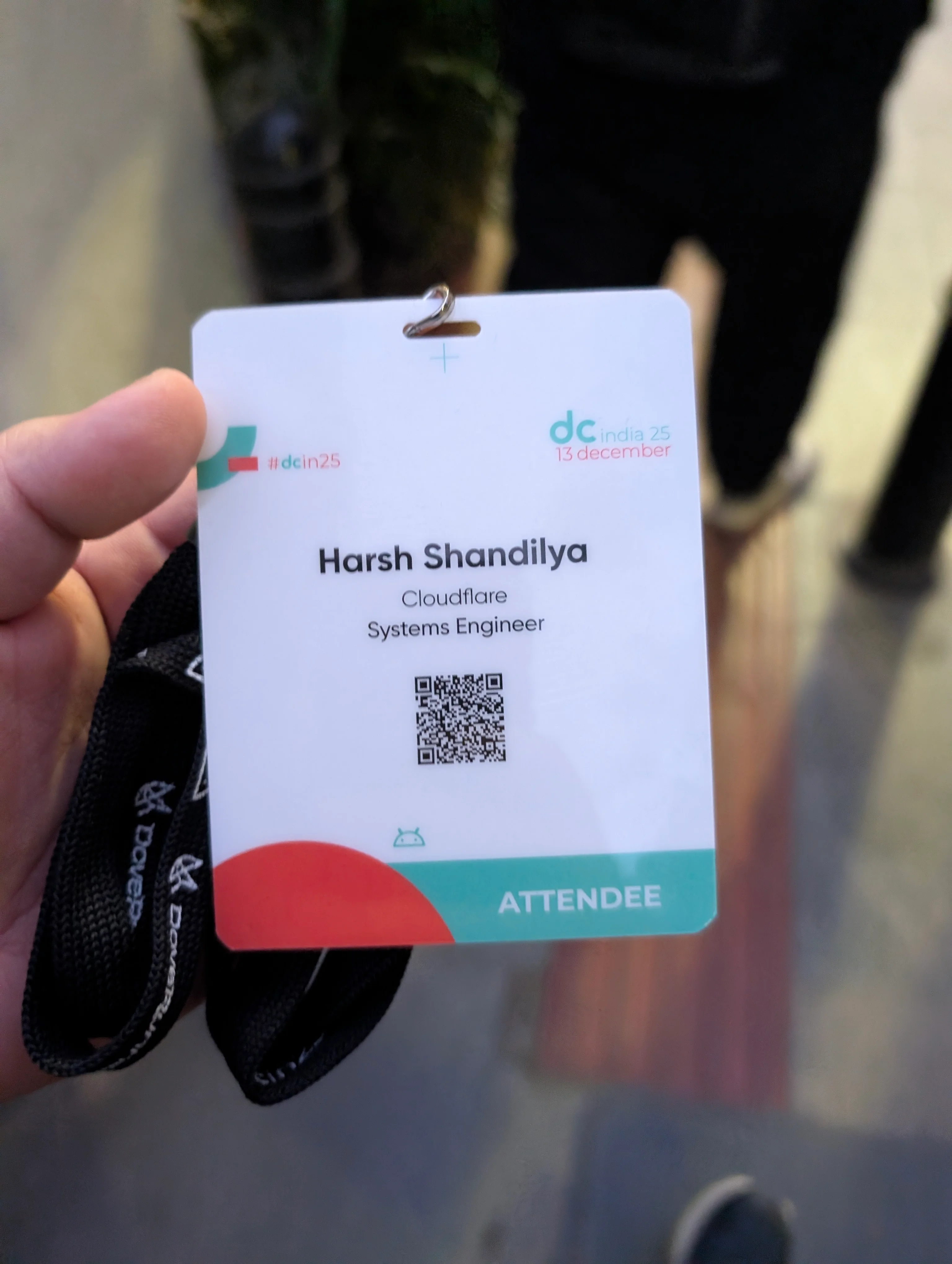 My droidcon 2025 badge with my name, company and role.